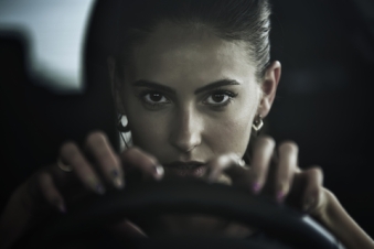 © Simba3003 | Dreamstime.com - Dangerous Beauty Woman Driving A Car, Close Up Portrait Photo